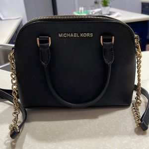 Michael Kors black mini crossbody purse.